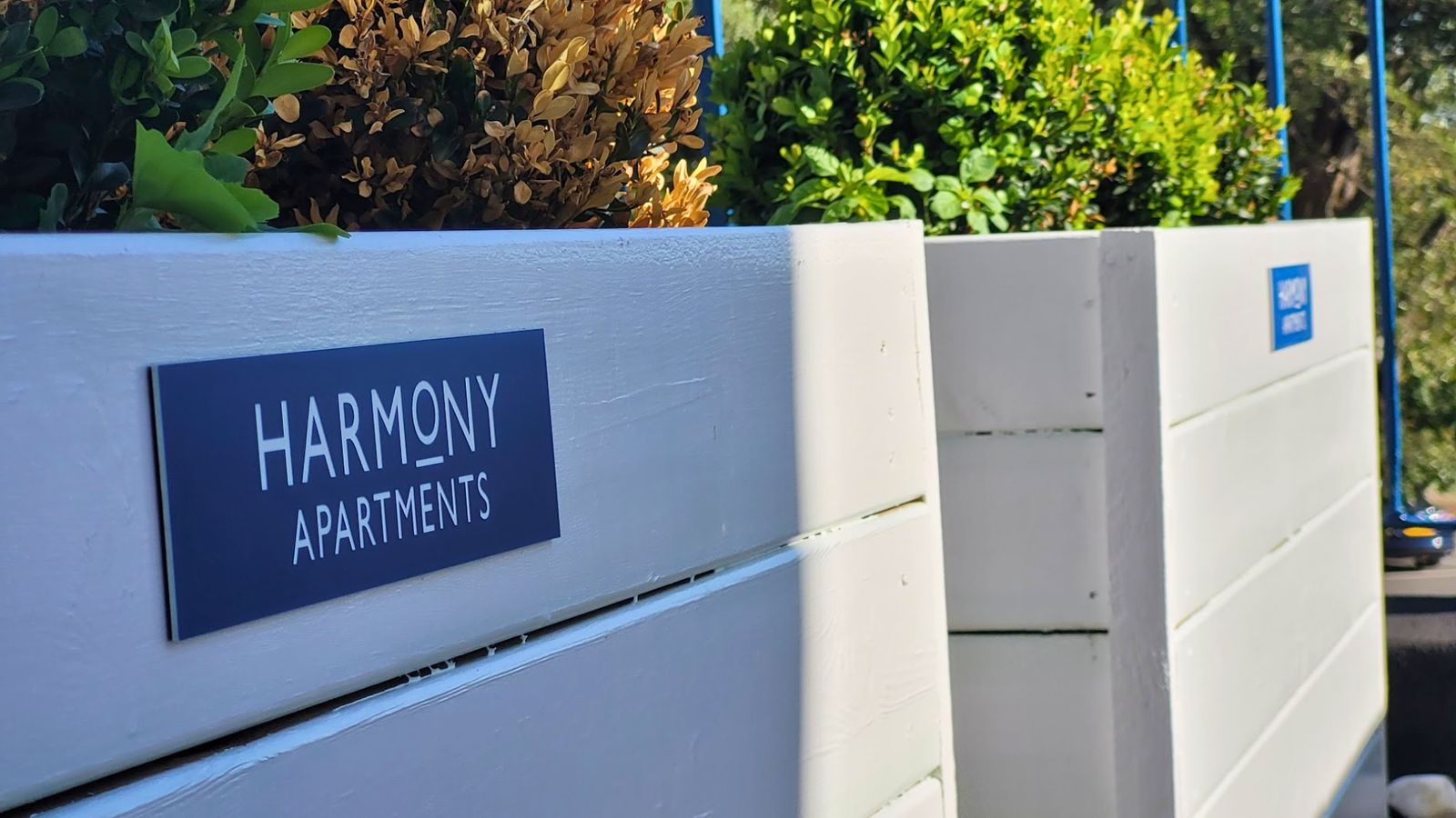 Bespoke engraved entrance sign for Harmony Apartments